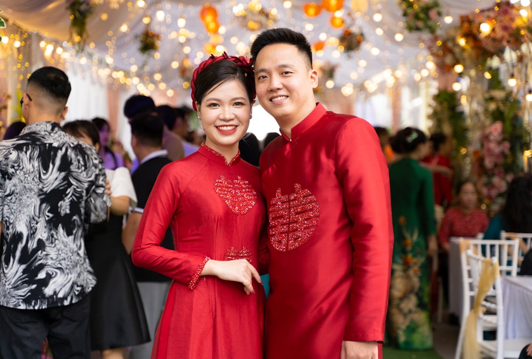 Elegant Vietnamese bride in traditional ao dai with intricate embroidery