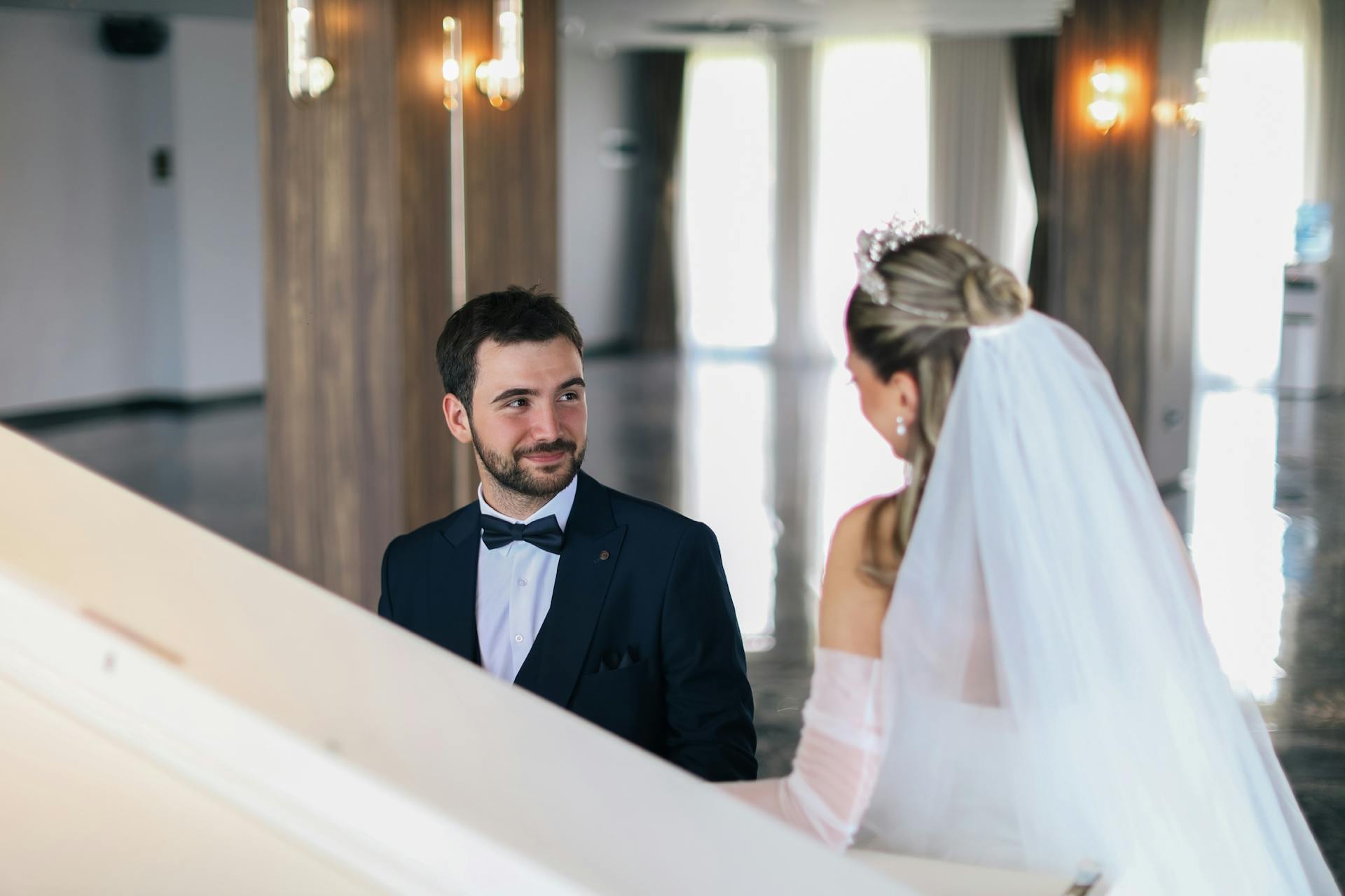 Couple at their minimalist black and white wedding