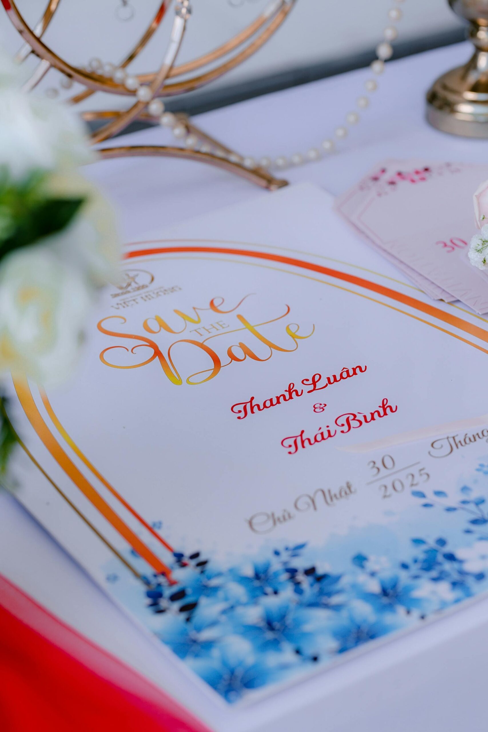 How to Create a Free Wedding Website: Simple Tools for Vietnamese Couples 1 Free wedding website — Elegant wedding invitation with floral design beside plannin