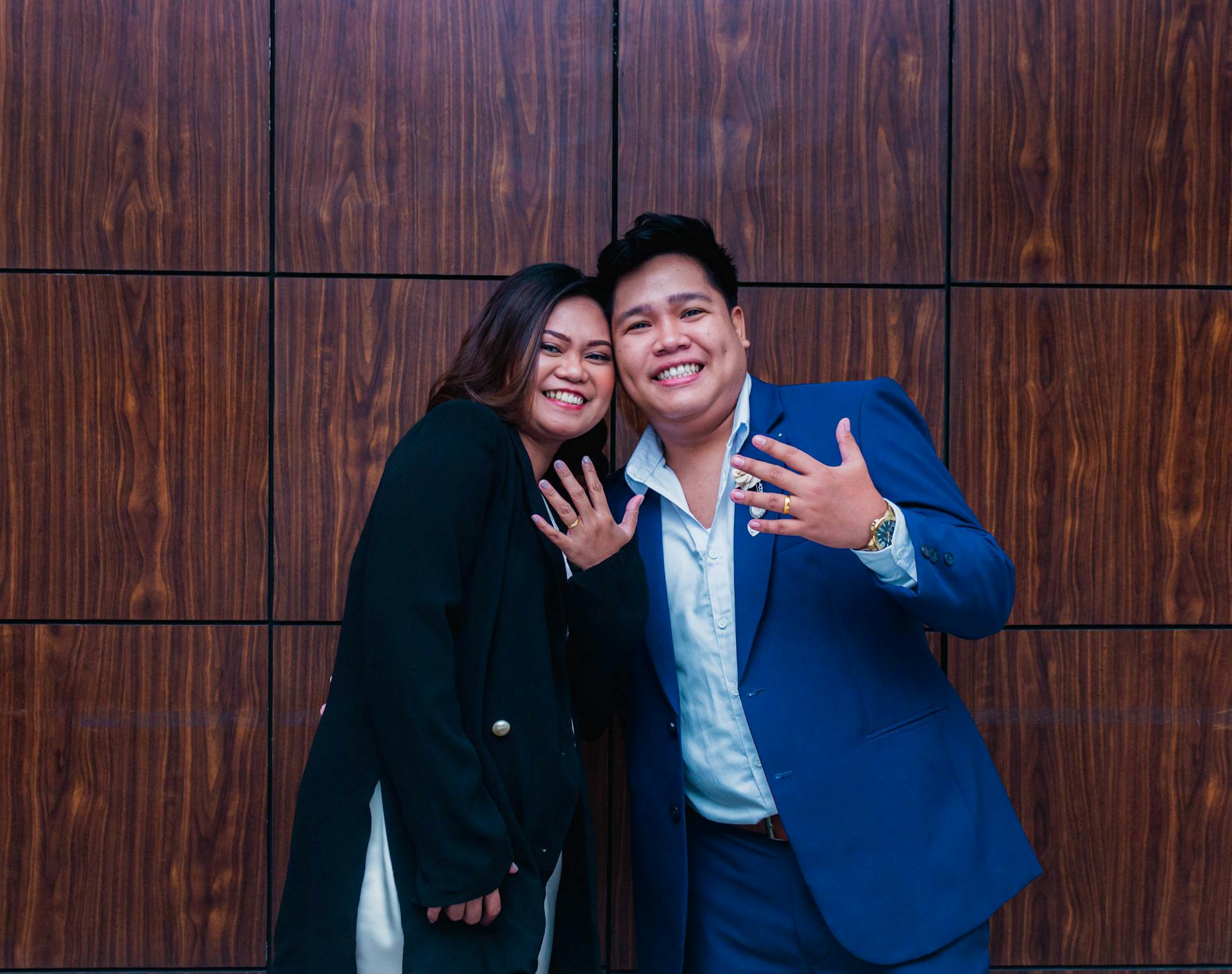 How to Create a Free Wedding Website: Simple Tools for Vietnamese Couples 3 Happy couple celebrating their engagement surrounded by warm light