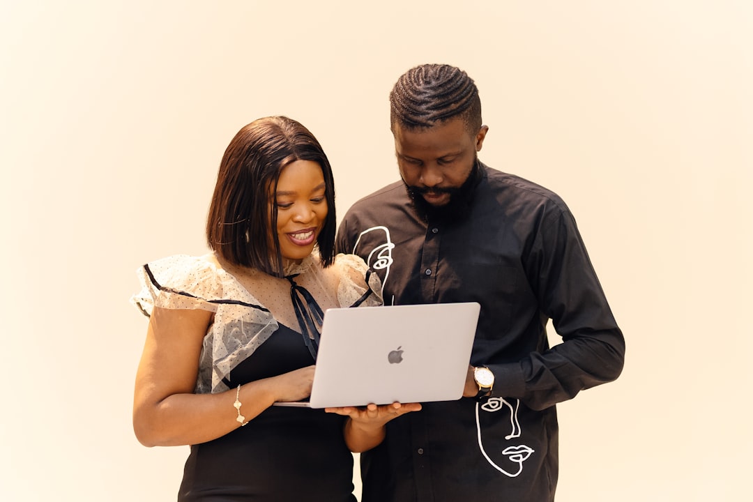Couple coordinating international wedding travel logistics