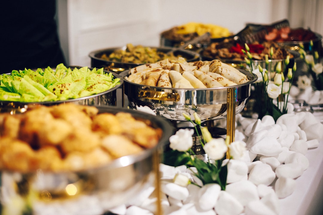 Beautifully plated wedding dinner table with elegant place settings and floral accents