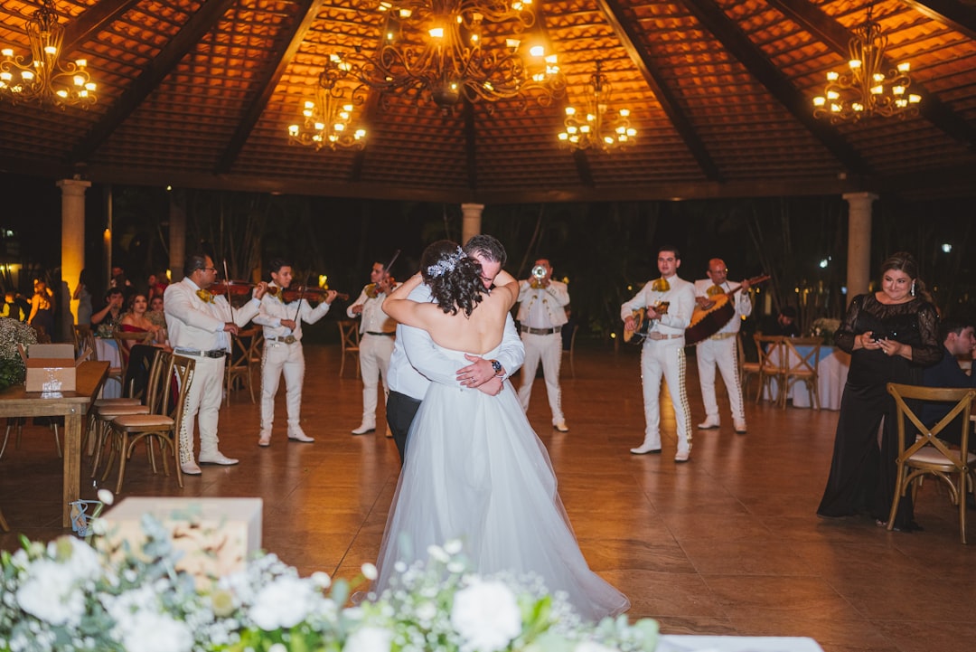 Wedding reception dance floor with live band performing for celebrating guests