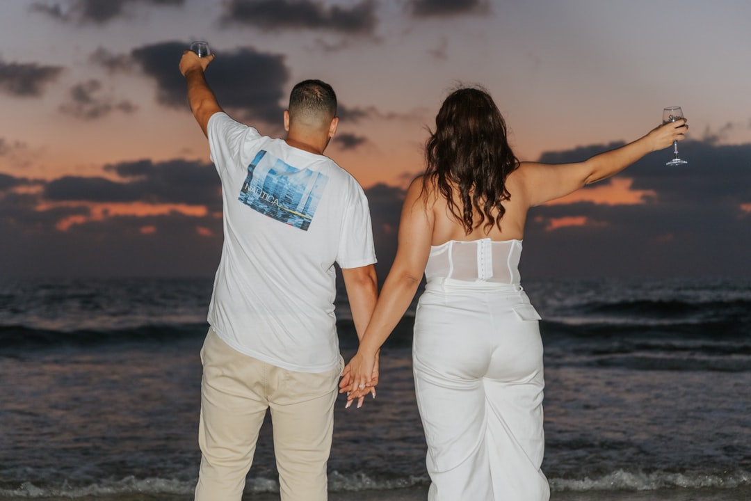 The 12-Month Wedding Planning Timeline: What to Do Every Month From Yes to I Do 1 Wedding planning timeline — Happy engaged couple celebrating their engagement with joy a