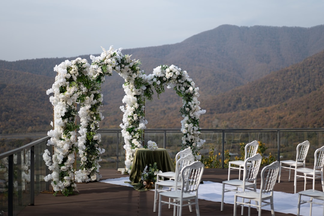 Vows ceremony planning — Beautiful wedding ceremony arch decorated with flowers and g