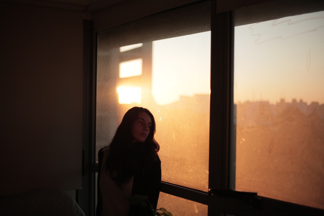 Bride getting ready with professional makeup in morning light